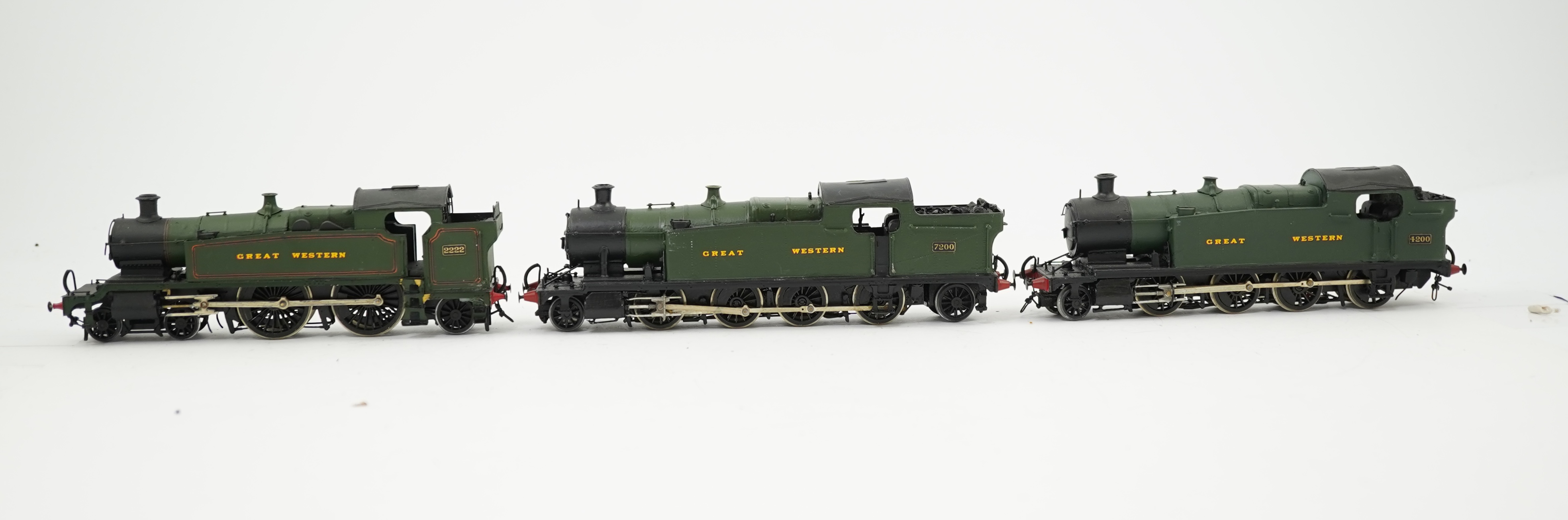 Three 00 gauge kit built GWR tank locomotives, two brass and white metal; a 42xx class 2-8-0T, 4200, together with an 72xx class 2-8-2T, 7200, plus a plastic/resin and metal 22xx class 4-4-2T, 2222, all constructed, pain